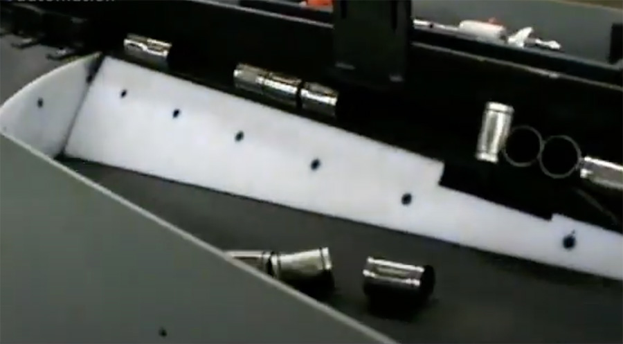 Bi-directional Orienting Conveyor